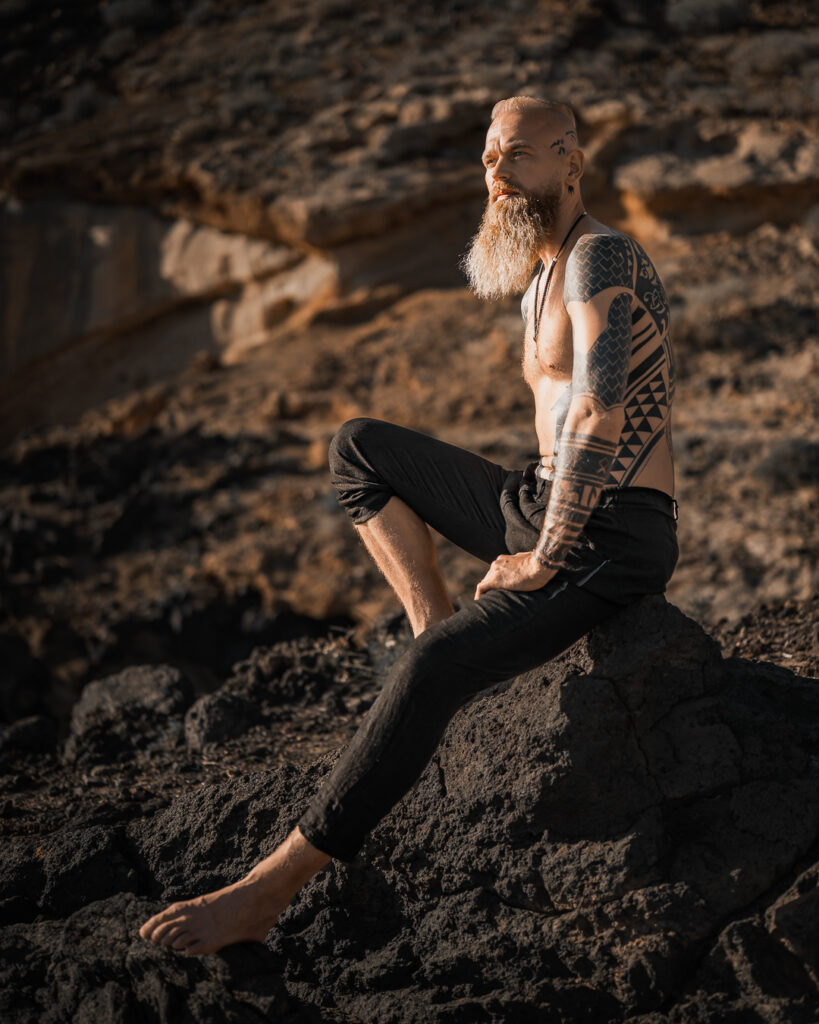 Outdoor male portrait photography in Tenerife South on volcanic rocks