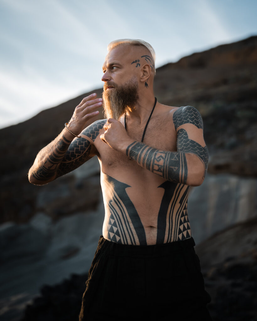 Artistic male portrait photography in Tenerife South with tattoos and dramatic light